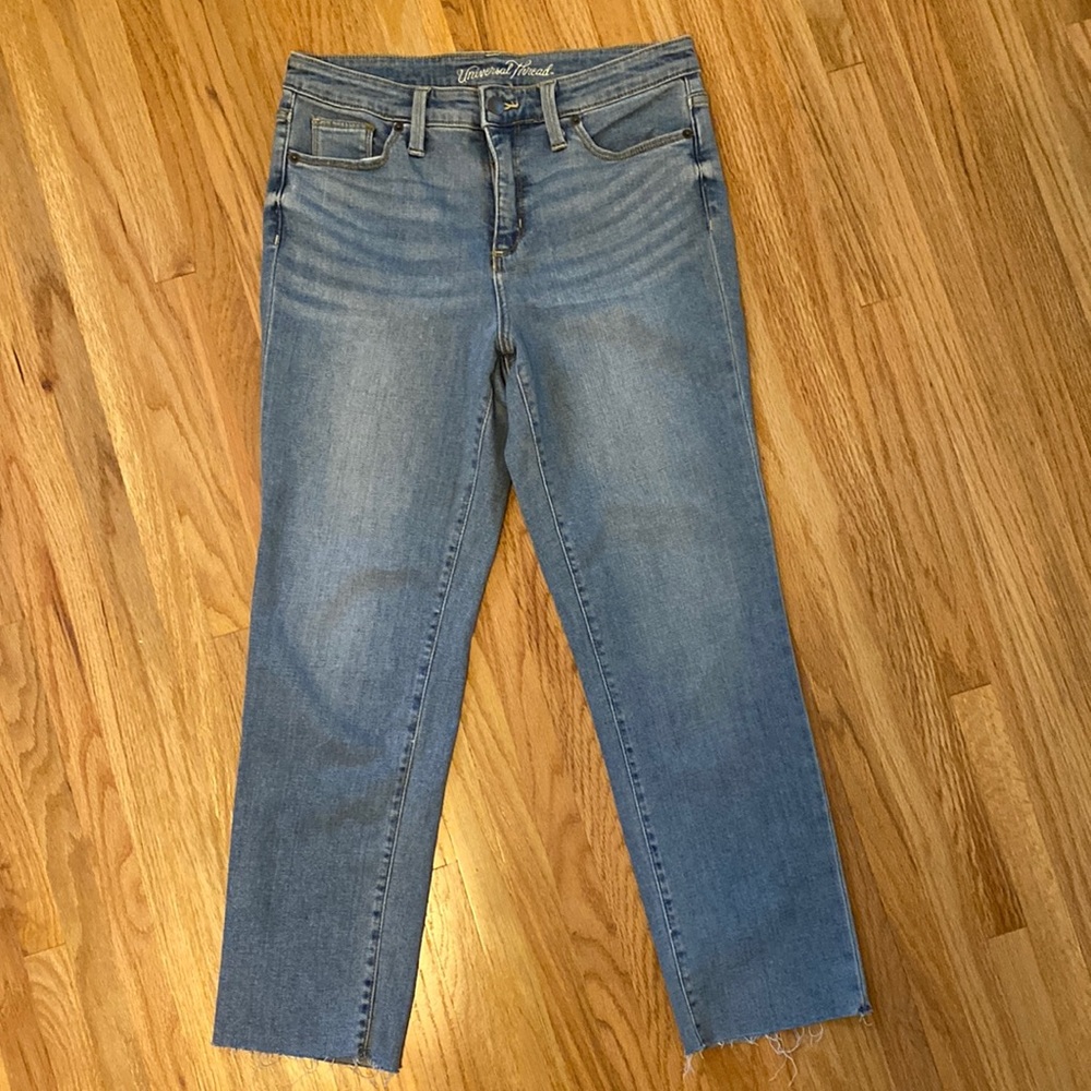 Womens jeans, size 6/28. Mom jeans with frayed bottoms.